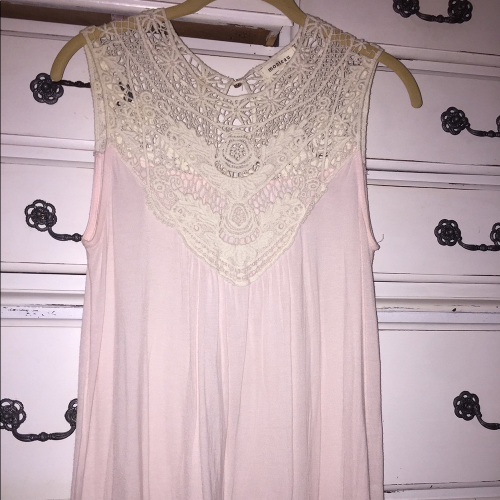 pink top with woven detail